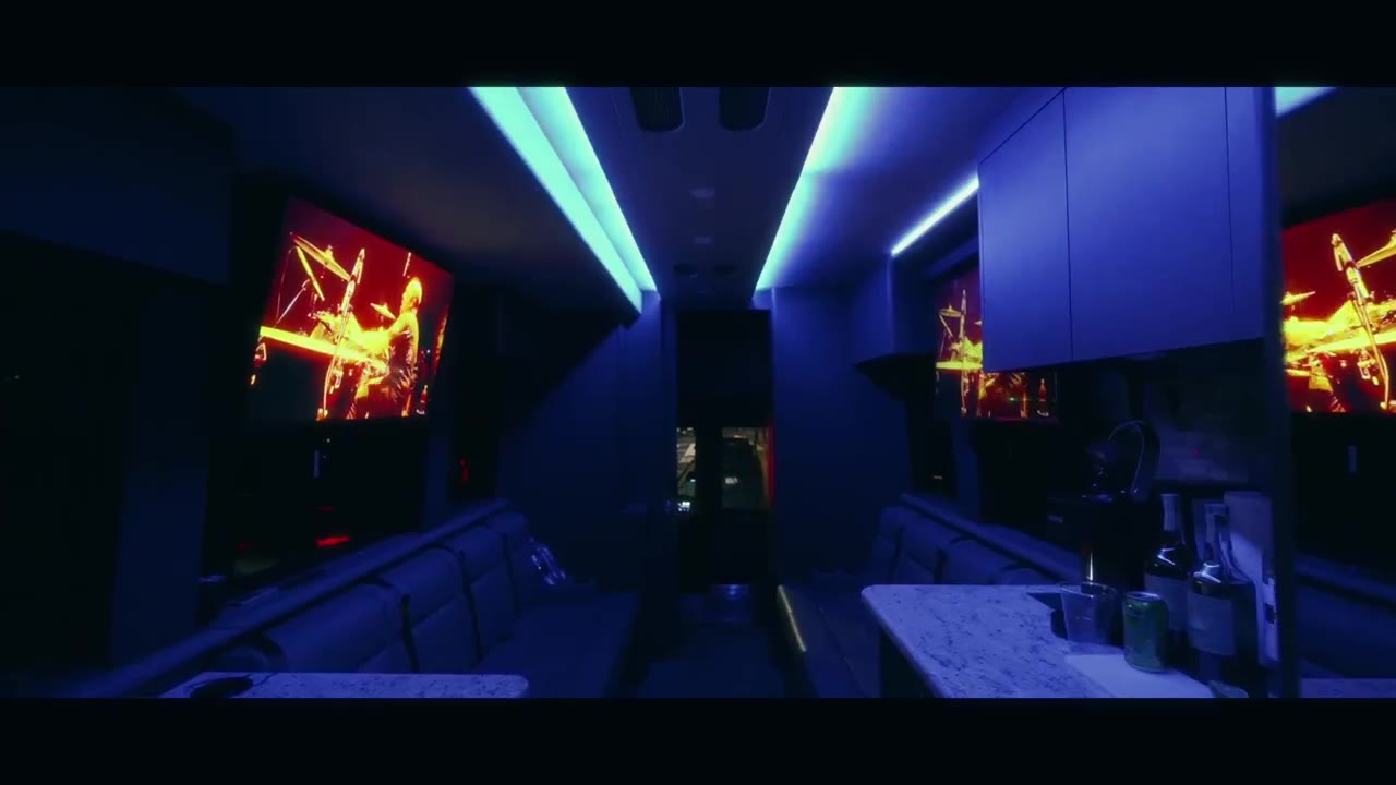 Interior of a luxury party coach lit in blue during big game weekend