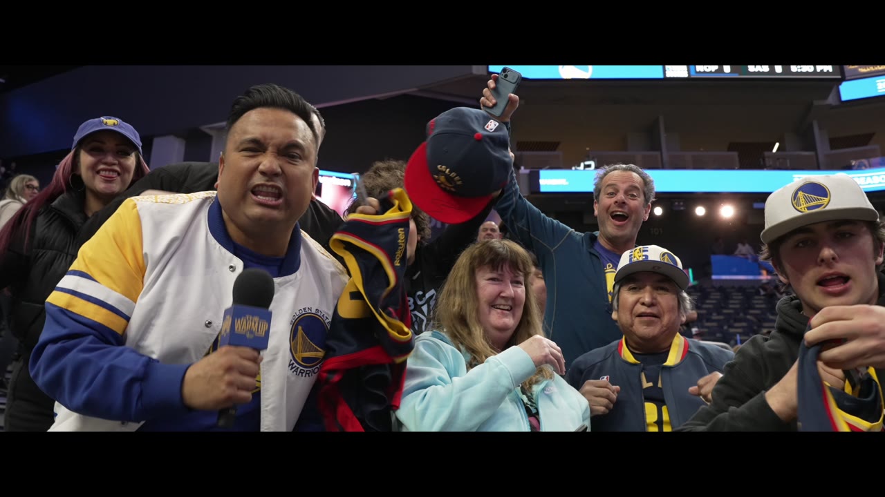 Franco Finn on the mic with fans in an arena